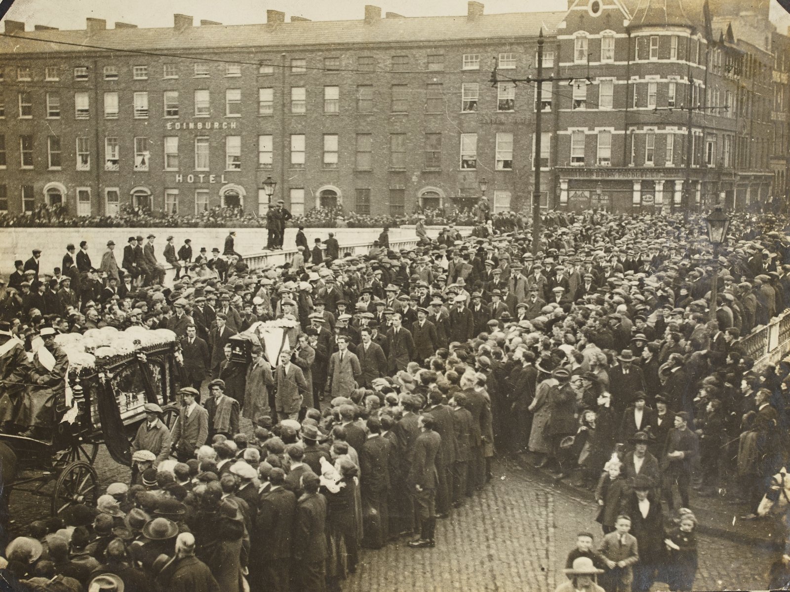A photograph by Hogan of the funeral of a prominent Republican passing over St. Patrick's Bridge, Cork Image courtesy of the National Library of Ireland