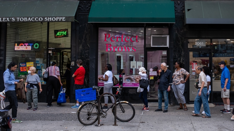 People queuing up in New York to buy lotto tickets during the week