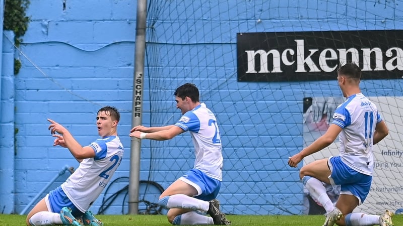 Thomas Lonergan (l) celebrates with teammates, John Ryan, centre, and Dylan Duffy after finding the net