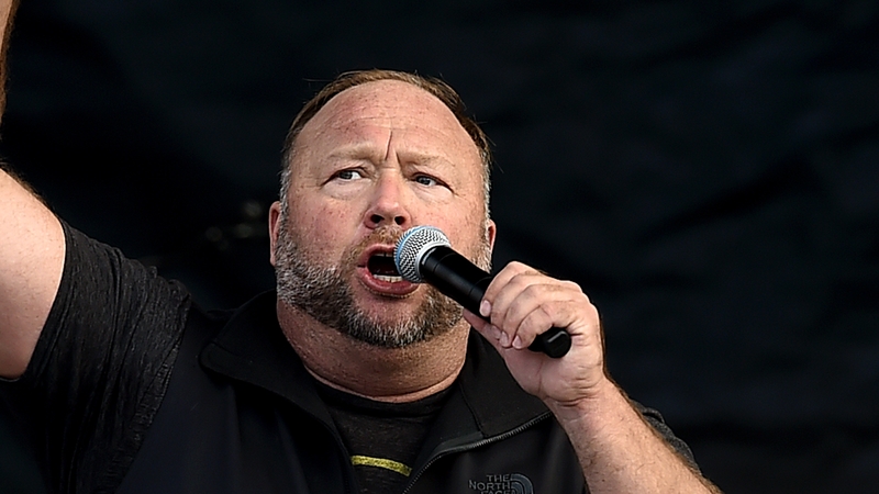 Alex Jones speaks to supporters of US President Donald Trump as they demonstrate in Washington, DC in 2020 (file pic)