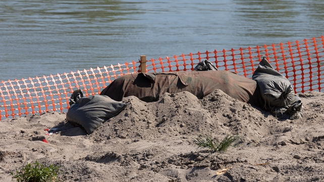 The drought-stricken waters of the River Po in Italy are running so low they revealed a previously submerged World War II bomb