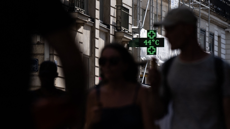 A temperature sign reads 44C in Nantes, France on 18 July