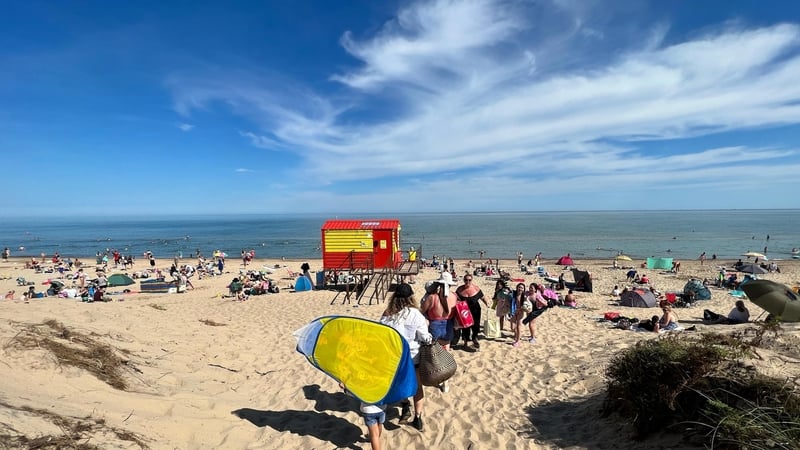 As crowds flock to Brittas Beach, older people are being asked to protect themselves from the heat