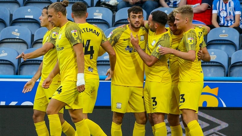 Troy Parrott is congratulated by his Preston team-mates