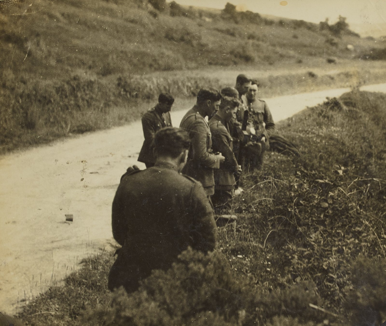 Days after the ambush, soldiers pray at the spot Collins was shot (Pic: National Library of Ireland)