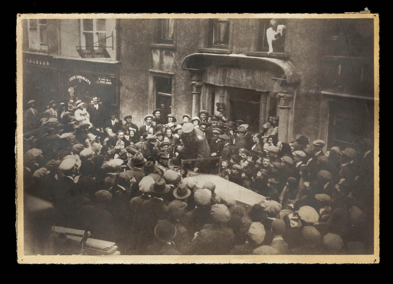 Michael Collins gets into the Touring car outside Eldon's Hotel in Skibbereen, to begin the return journey that would end at Béal na Bláth. To the very end, crowds cheered him (Pic: Cork Public Museum)