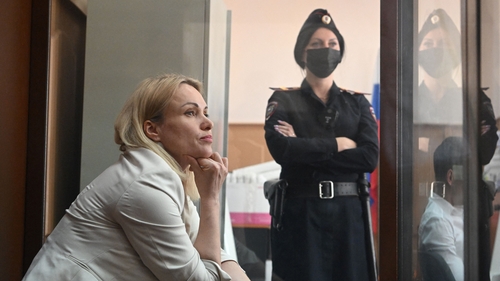 Marina Ovsyannikova (L) is charged with spreading fake news about Russia's armed forces