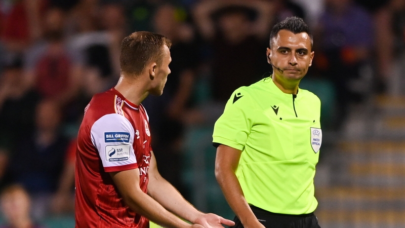 Jamie Lennon protesting the crucial penalty decision