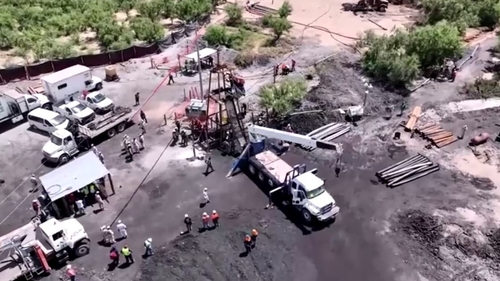 Rescue teams at the mine where 10 miners remain trapped