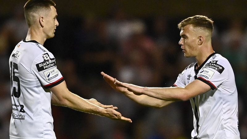 Darragh Leahy (left) celebrates with Lewis Macari after the final whistle