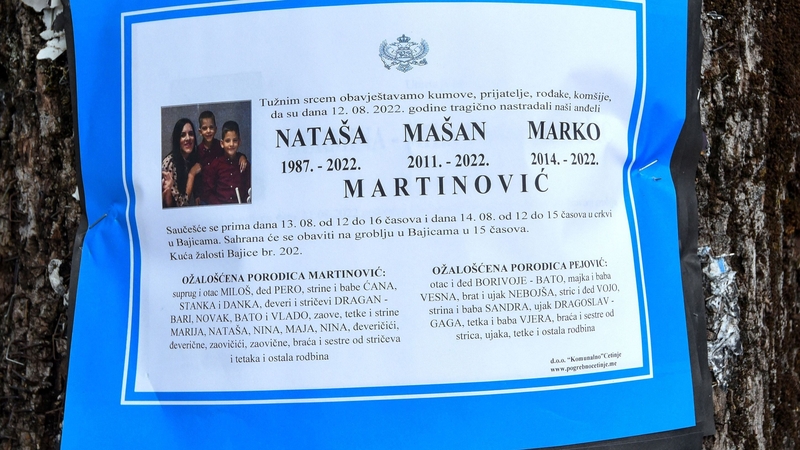 An obituary poster of a family killed during the mass shooting in Cetinje, Montenegro