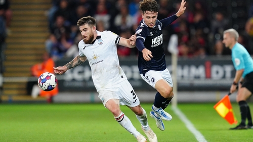 Ryan Manning (L) scored his first goal for Swansea but his team self-destructed at the finish