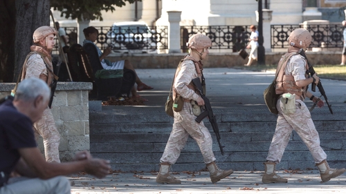 Russian Navy patrol the headquarters of Russia's Black Sea Fleet in Sevastopol, Crimea