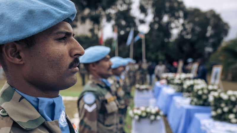 Military from the UN mission in the Democratic Republic of Congo attend a ceremony for peacekeepers who died during violent protests last July