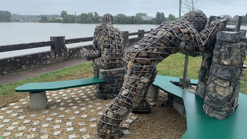 The commemorative bench entitled 'Giants of Men', is located at Barrington's Pier in Limerick City