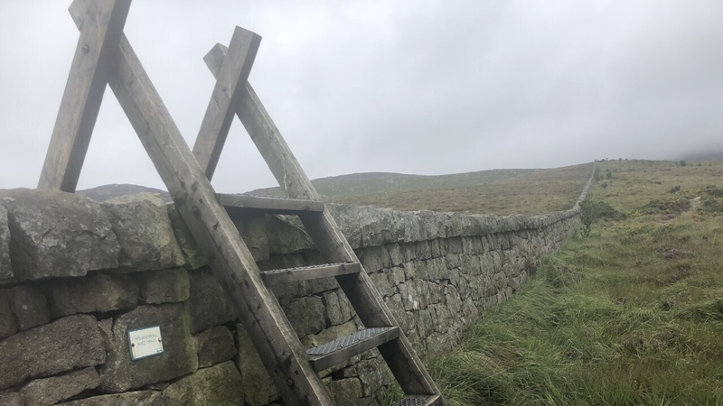 Stonemasons take a daily hike of up to 6kms to work on the wall