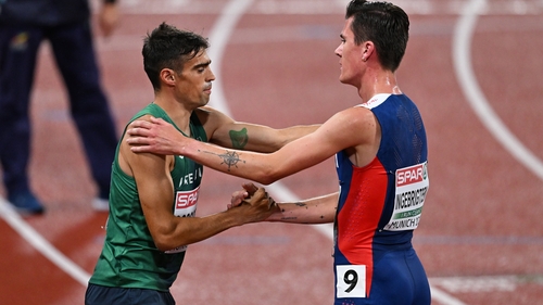 Andrew Coscoran congratulates Jakob Ingebrigtsen (R) of Norway after his gold-medal win