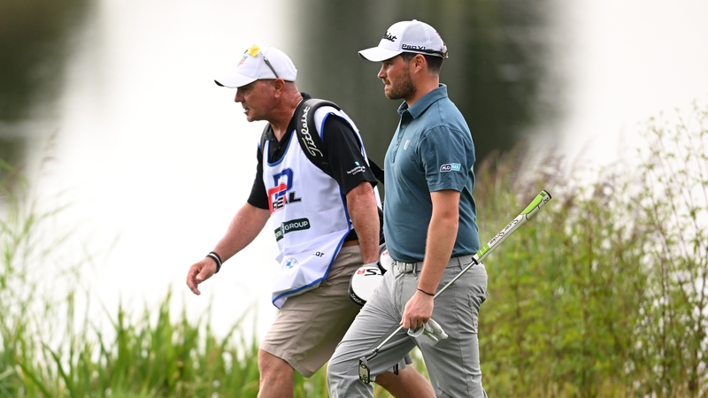 Cormac Sharvin walks along the ninth fairway