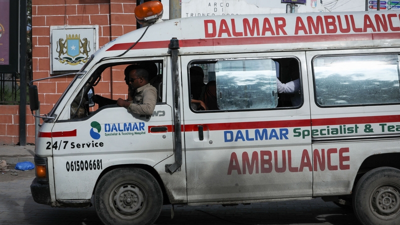 An ambulance is seen near the the site of the Hayat hotel in the Somali capital of Mogadishu