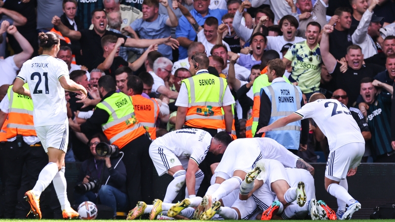 Brenden Aaronson is mobbed after his goal