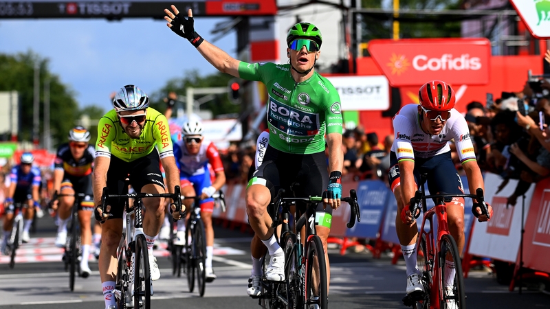 Sam Bennett celebrates his win on stage three in the Netherlands