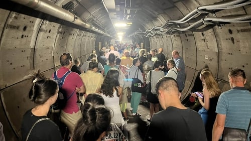 Passengers had to walk through the service tunnel (PA/Pic: Kate Scott)
