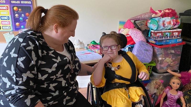 Brianna Phelan, pictured with her mother, has been waiting on back surgery for three years