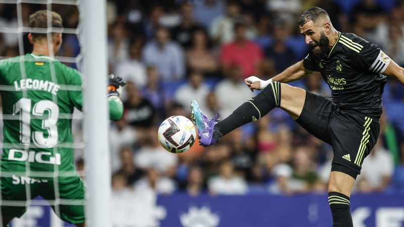 Karim Benzema netted twice late on