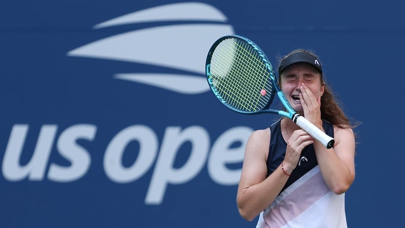 Daria Snigur is overwhelmed by emotion after her victory over Simona Halep