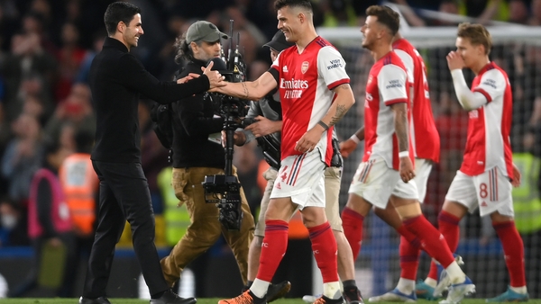 Xhaka praised the competitive mindset of manager Mikel Arteta (L)
