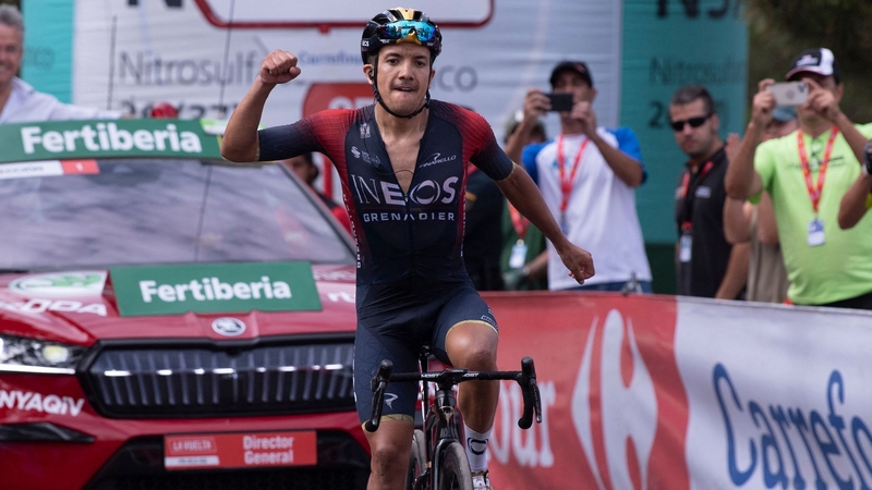 Richard Carapaz celebrates as he crosses the line