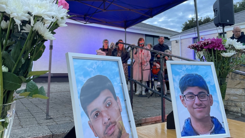 A folk group singing at vigil for teenage drowning victims Reuven Simon and Joseph Sebastian