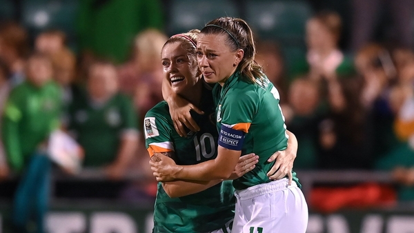 Denise O'Sullivan (L) embraces Katie McCabe at the final whistle