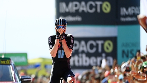 Thymen Arensman crosses the line to win the stage
