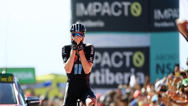 Thymen Arensman crosses the line to win the stage