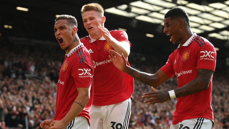 Antony (L) celebrates with Scott McTominay and Marcus Rashford