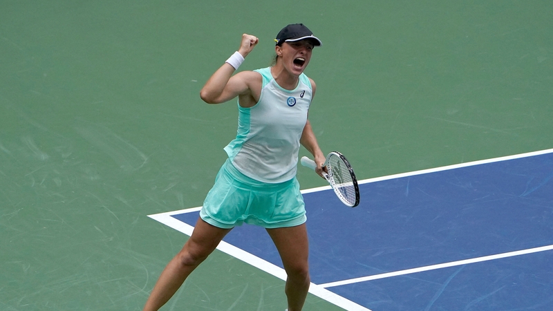 Poland's Iga Swiatek celebrates defeating Germany's Jule Niemeier