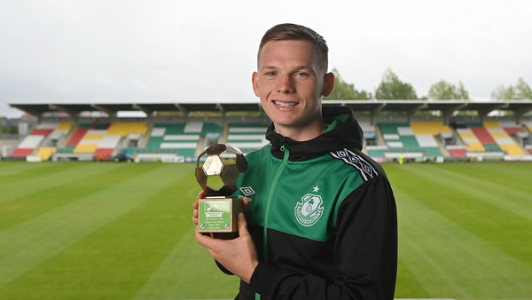 Andy Lyons with his award