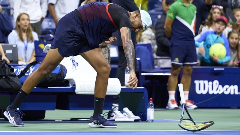 Nick Kyrgios destroys a racket after exiting the US Open