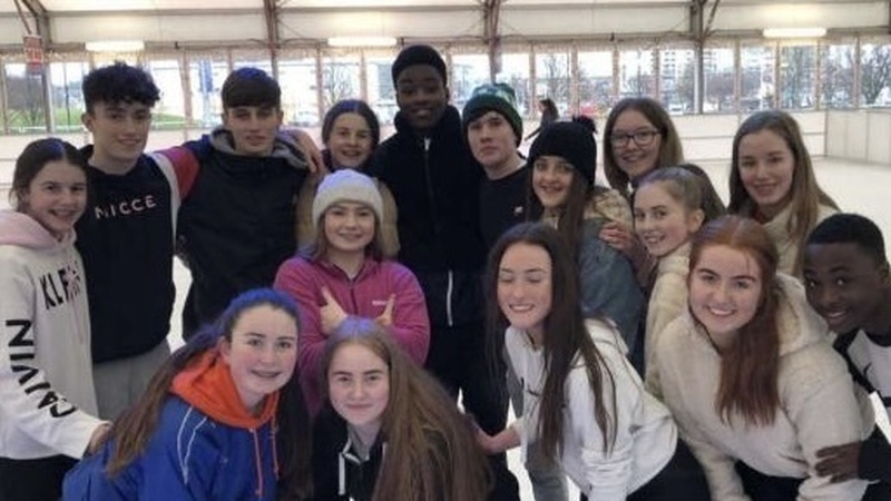 Kian (back row, third from left), Nonso (back row, centre), and Sophia (centre left in pink)
alongside their classmates