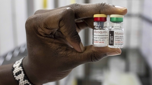 A person holds two vials of the Mosquirix vaccine in Nairobi, Kenya, in 2021 after the WHO backed the widespread rollout (file pic)