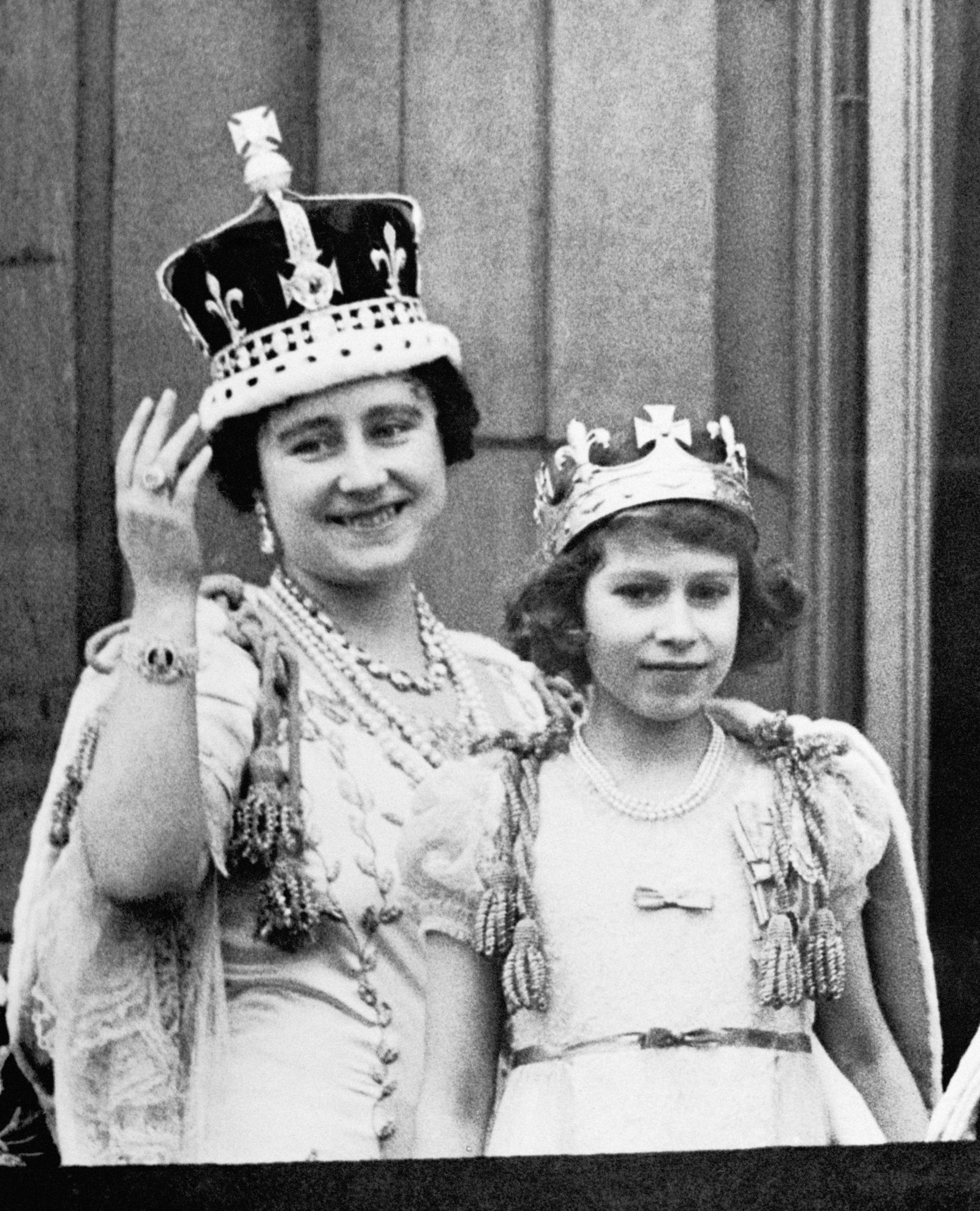 A young Elizabeth with her mother (Elizabeth, later the Queen Mother) after the coronation of her father King George VI in 1937. His ascent to the throne was a result of the crisis that followed the abdication of Edward VIII