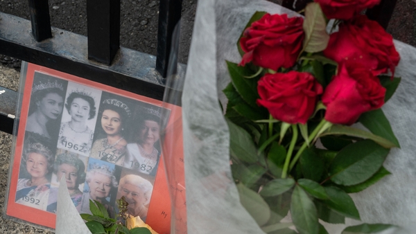 A flower bouquet and message outside the British embassy in Tokyo, Japan