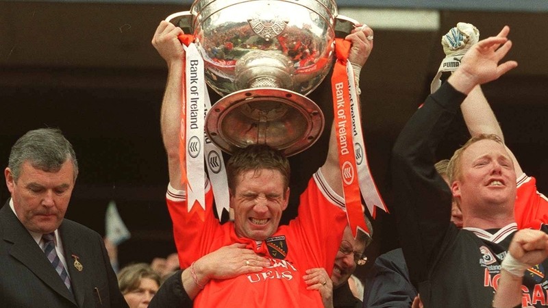 Kieran McGeeney becoming the first and only Armagh captain to lift Sam Maguire in 2002