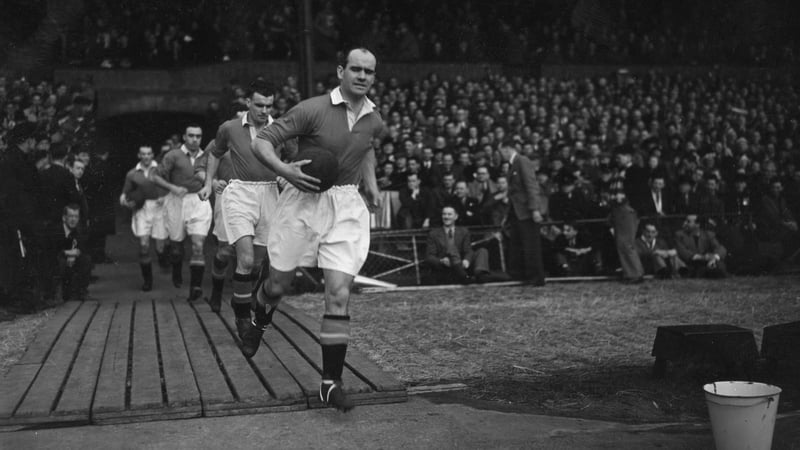 Johnny Carey leading Manchester United out at Old Trafford