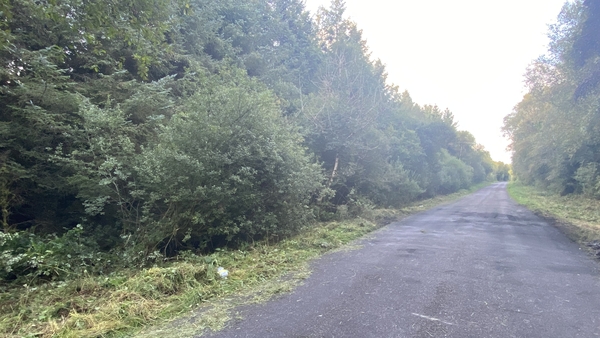 The road where two children died in a car fire has reopened