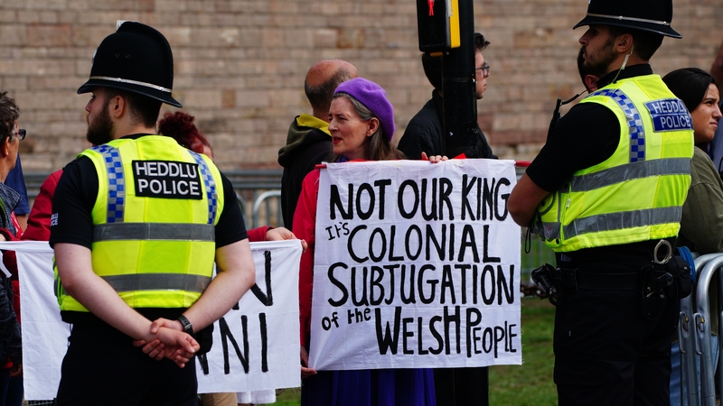 People protesting ahead of the accession proclamation ceremony at Cardiff Castle in Wales