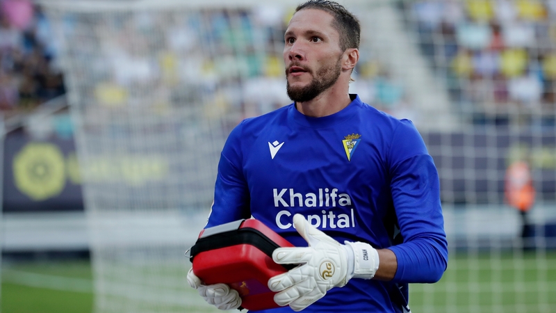 Jeremias Ledesma brings a defibrillator to help a supporter in the crowd