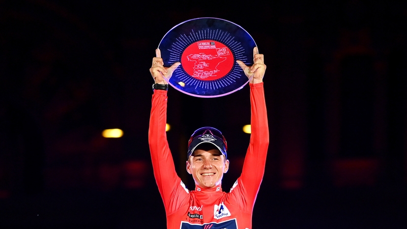 Evenepoel celebrates his first Grand Tour win