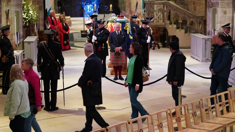 King Charles and his siblings stand vigil at the queen's coffin as members of the public file past